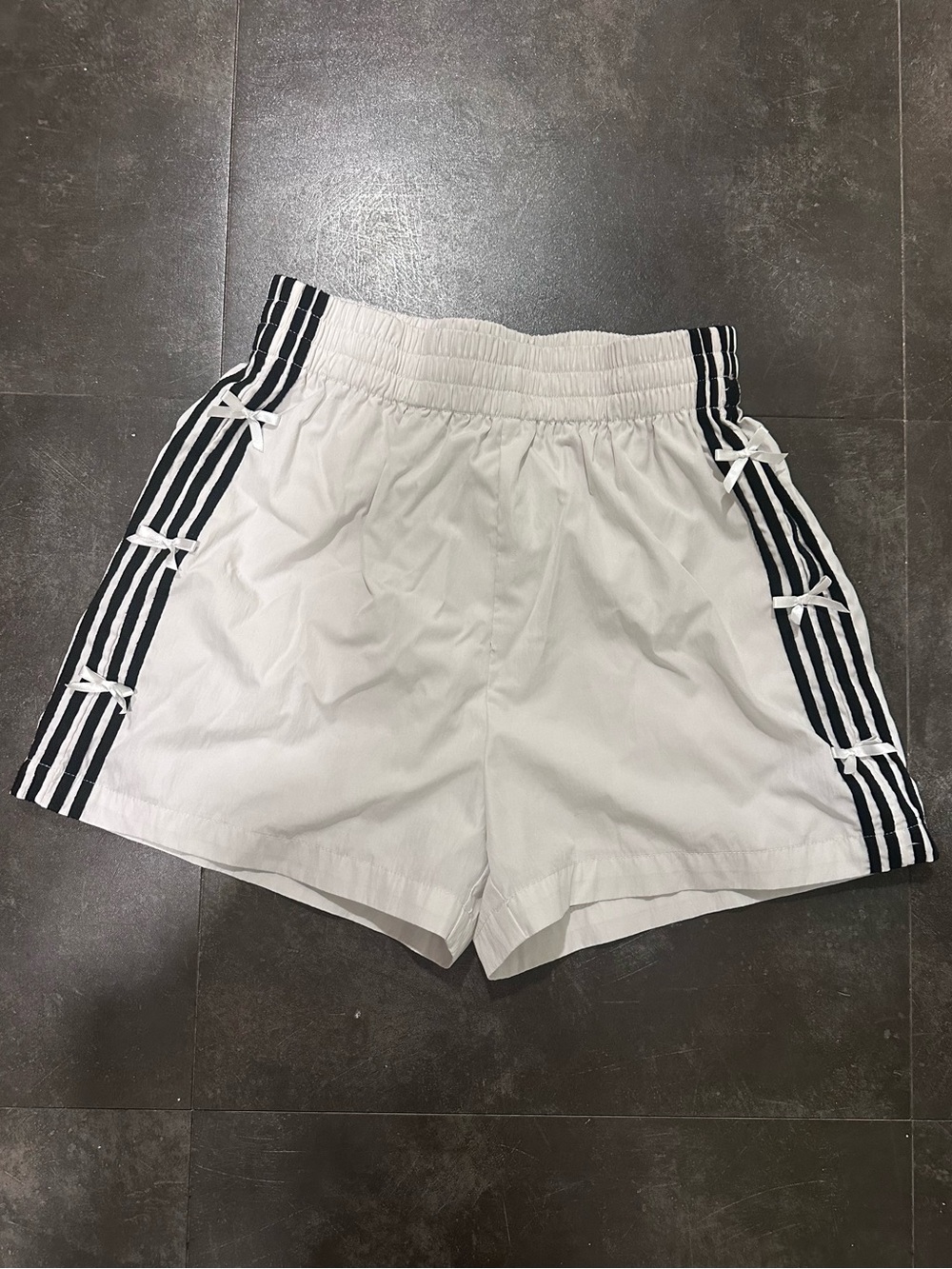 PacSun White Athletic Shorts with Black Stripe and Bow Detail